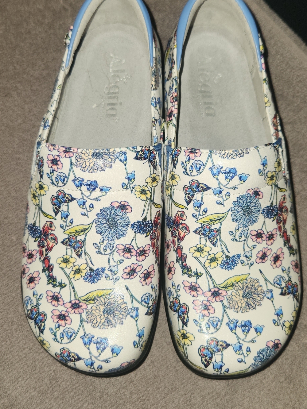 Alegria White Floral Slip-On Loafers with Blue and Pink Accents